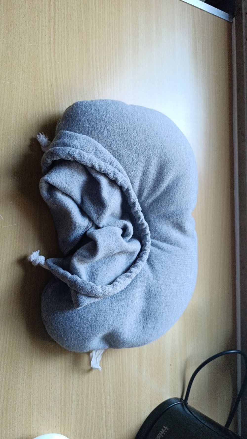Oreiller de voyage avec capuche